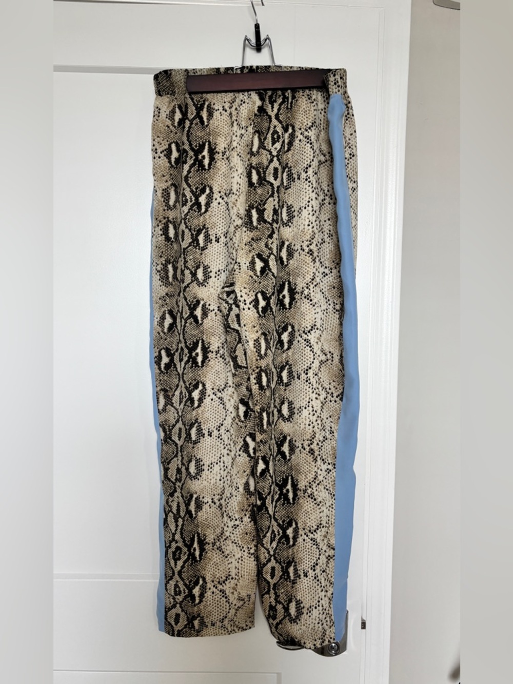 Decker Snake skin with blue stripe pattern women’s pants (size large)